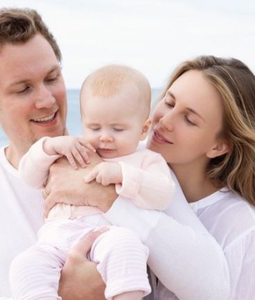 Barron Hilton II With Wife And Child